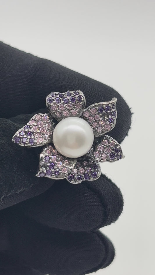 Flower-shaped ring 925 silver with original pearl and Rondel stones in purple and light purple tones.